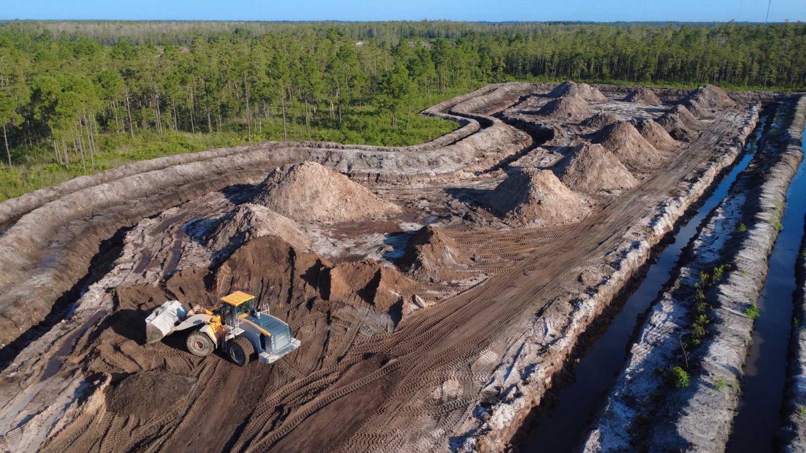 Aerial drone volumetric measurement of borrow pit stockpiles in Central Florida